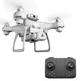 Mini quadcopter drone with front camera and four arms, shown with black remote controller