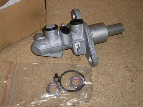 Light grey diecast car engine and accessory parts with small metal components