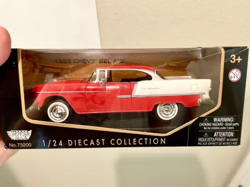 Red 1/24 diecast model car with white roof, in clear blister packaging
