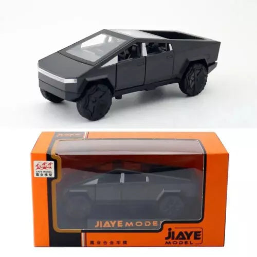 Diecast metal pickup truck scale model toy, black with silver accents and angular cab.