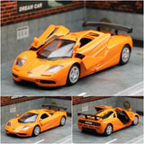 Orange diecast supercar model with detailed cockpit, front lights, and open doors
