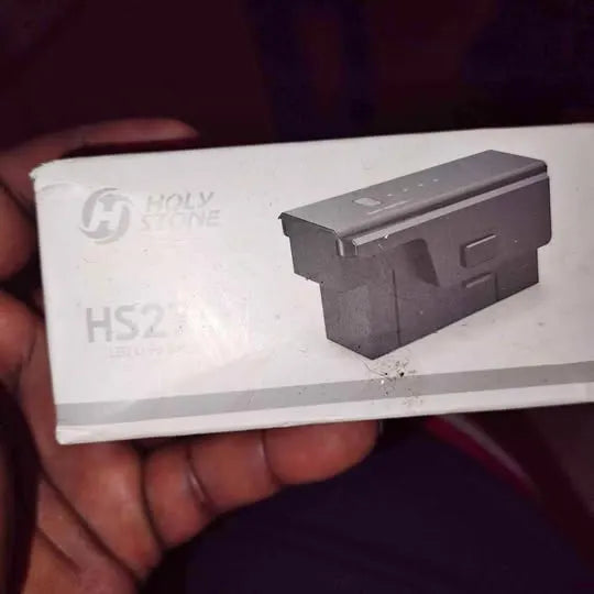 Drone charger module in gray on white box with HS2 marking