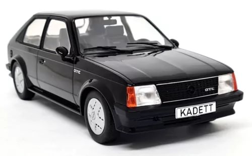 Black 1983 style diecast coupe model car with front 3/4 view and hood scoop