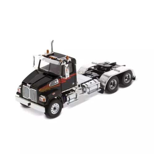 Diecast Masters truck-tractor model with black cab, chrome grille, and tandem wheels
