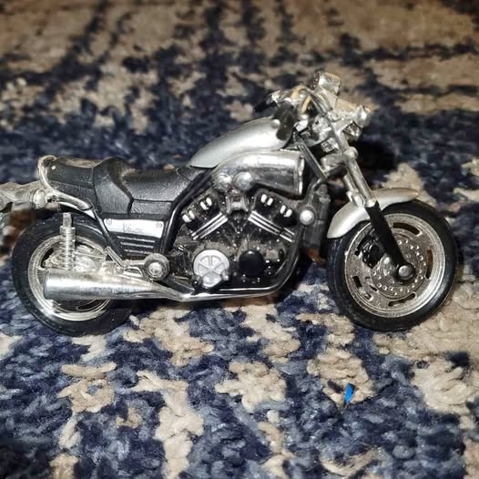 Harley Davidson diecast motorcycle, silver chrome, detailed engine and handlebars