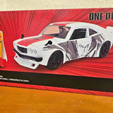 White diecast car with red racing stripes and black wheels, front three-quarter view