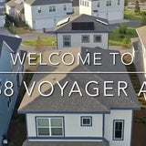 Aerial suburban house with 'WELCOME TO 8 VOYAGER' text overlay
