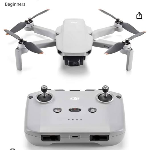 Compact DJI drone with foldable propellers and white transmitter controller