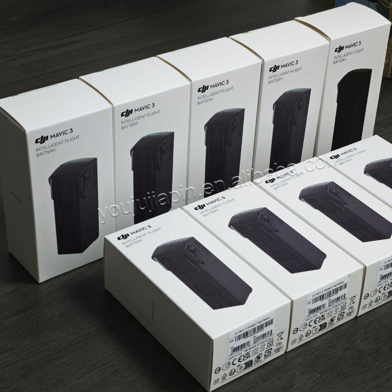 Drone intelligent flight battery pack set, black batteries in white retail boxes