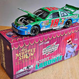 1:24 NASCAR diecast race car in green and blue livery, shown on display box