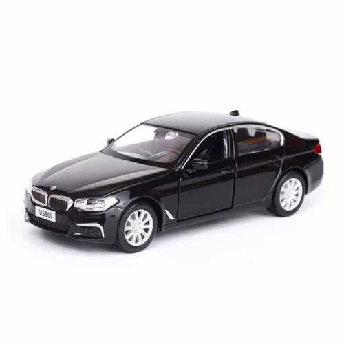 1:36 scale black BMW M550i xDrive diecast model car, front 3/4 view