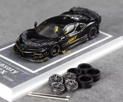 Black diecast racing sports car with spare wheel set and tools
