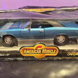 Blue 1:18 scale 1967 Chevy Chevelle diecast car, side profile with black roof.