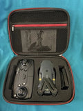 Foldable sub-250g drone in zippered hard case with controller and accessories