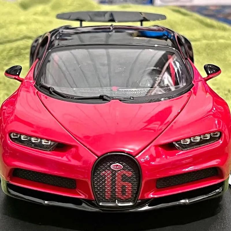 Bugatti Chiron diecast model car, red front view with headlights and grille