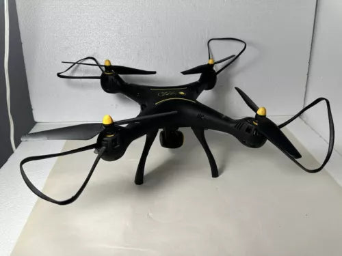 Syma X8 SW drone for parts, black quadcopter with four propellers and yellow lights.
