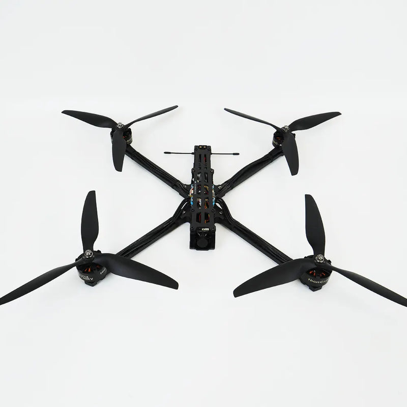 Black FPV racing drone with four propellers and central camera mount