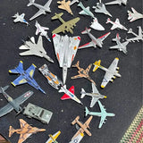 Assorted diecast toy airplanes, mixed colors, lot of 30 aircraft models
