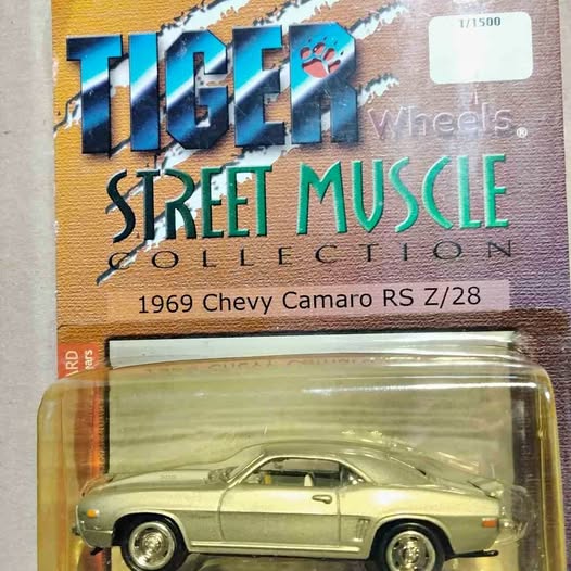 1/64 diecast classic Camaro model car with light green body and chrome wheels