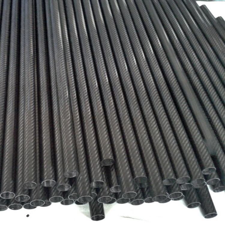 3K carbon fiber rolling wrapped tubes bundle, showing end caps and woven pattern