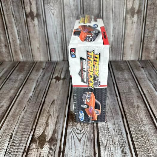 1:64 diecast pickup truck model in white and orange retail box