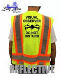 Hi-visibility safety vest in bright green with orange reflective stripes, back