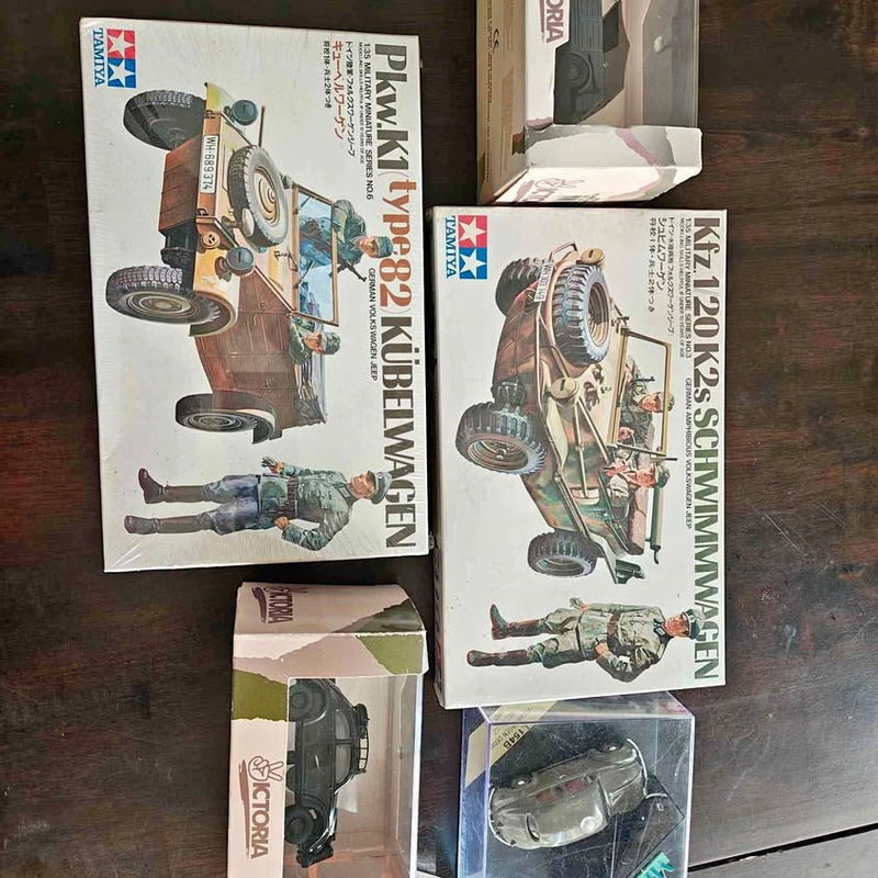 Boxed model car and diecast car set with assorted vehicles in packages