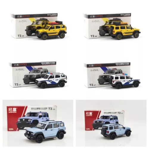 Yellow off-road diecast model car toy with black wheels, in retail box