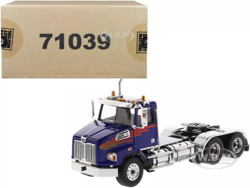 Blue diecast day cab tractor with chrome grille and front wheels, angled view.