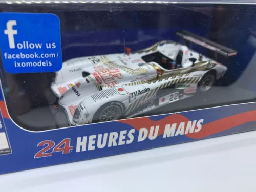 1:43 diecast race car model, white with multicolor graphics and #22, in display box