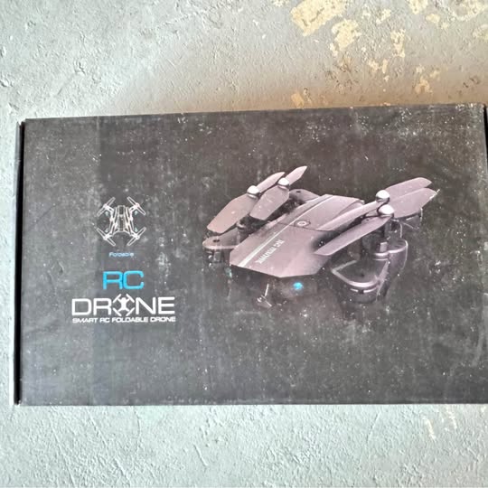 RC drone box with illustrated foldable quadcopter and RC Drone branding