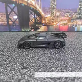 1/64 black carbon-style diecast sports car toy with detailed wheels