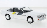 White diecast model car with black side stripe, front three-quarter view, white wheels.