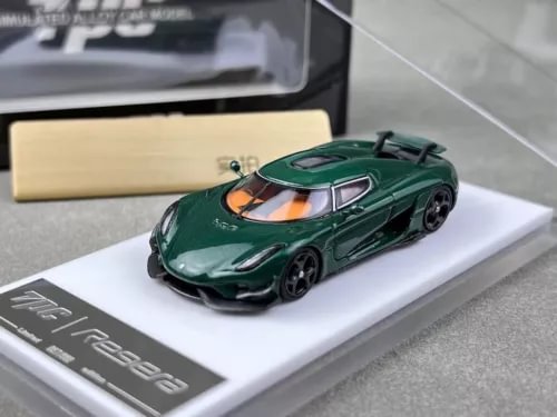 Green diecast sports model car with open cockpit detail
