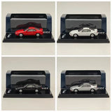 Diecast model car set in clear display cases, four cars in red, white, black, gray