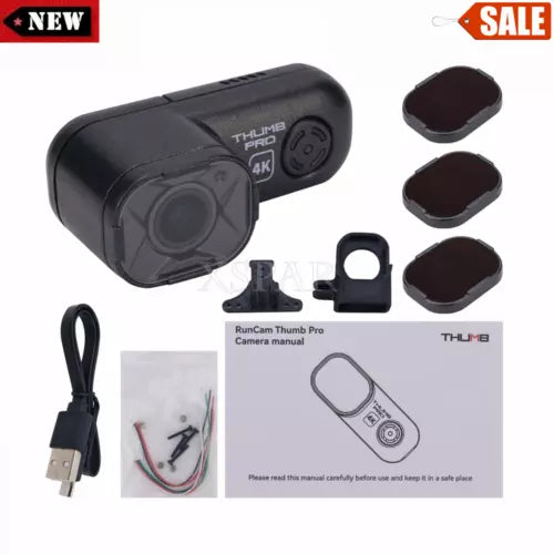 Black FPV thumb camera with lens, USB cable, mounts, and manual