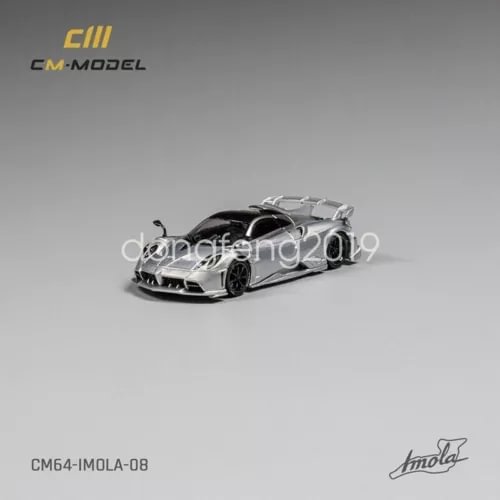 Silver diecast model car toy in front three-quarter view, low-profile sports coupe