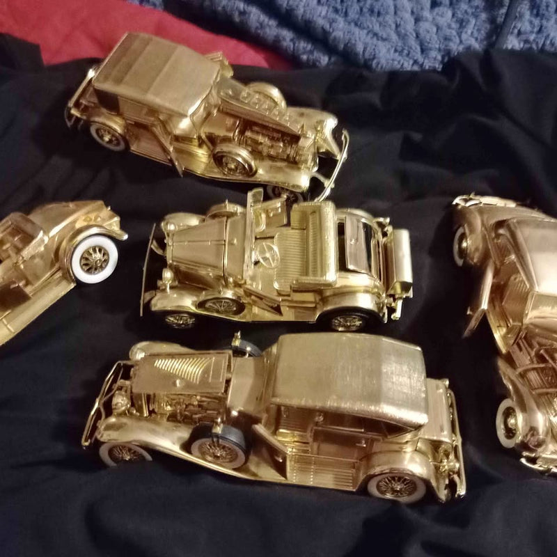 Metallic gold die-cast vintage car set of three cars with detailed wheels