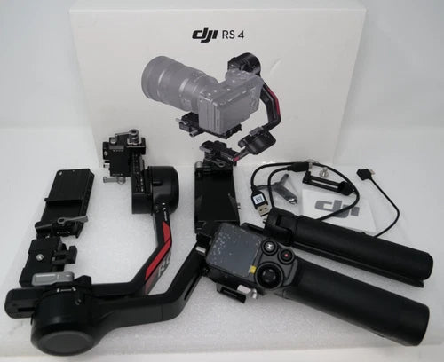 DJI RS 4 gimbal stabilizer with handheld camera control handle and mounted camera