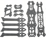 Black CNC carbon fiber mounting plates with cutout holes and slots