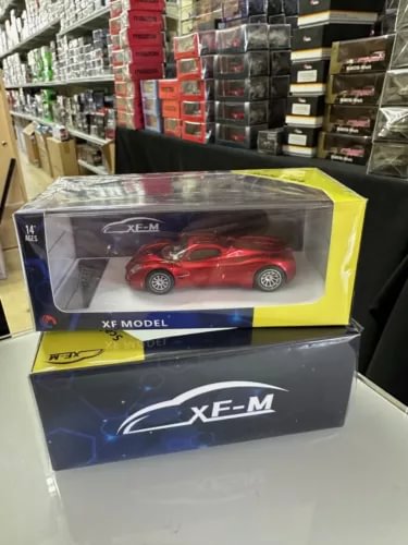 PAGANI UTOPIA red metallic diecast model car in clear display box