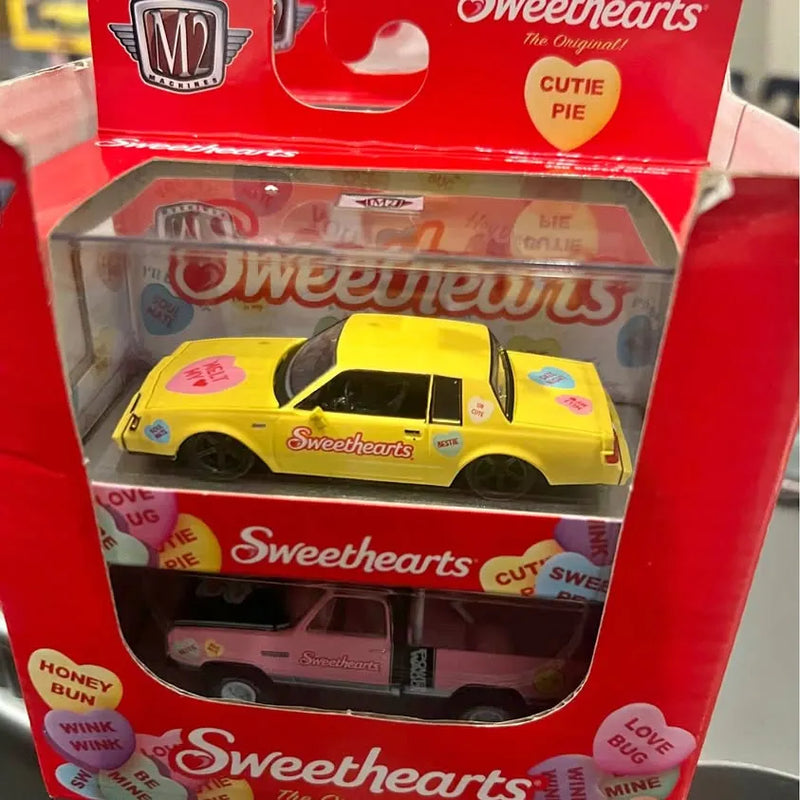 M2 diecast car model, yellow Sweethearts themed, shown in retail box