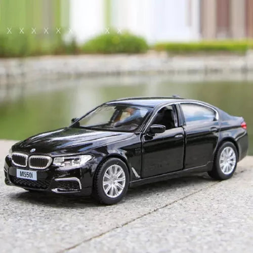 BMW M550i diecast toy car model, black coupe, alloy wheels, 1:36 scale