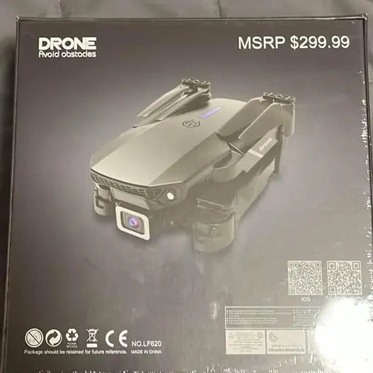 White foldable drone with front camera, shown on retail packaging