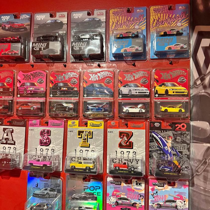 Diecast toy cars in blister cards, Hot Wheels and Mini diecast vehicles assortment