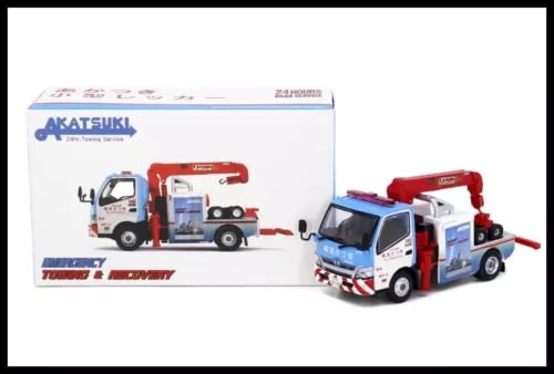 1/76 diecast tow truck model with white cab, red tow arm, and blue details