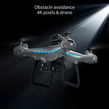 Grey RC quadcopter drone with front camera module and glowing blue LED lights