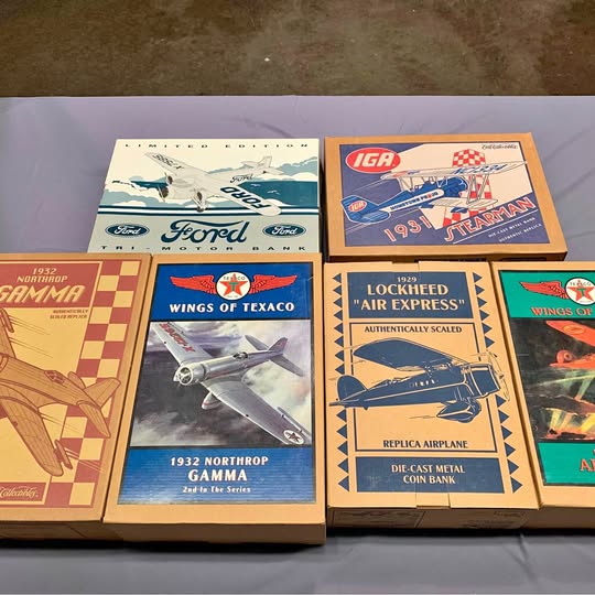 Diecast airplane model boxes with colorful aircraft illustrations