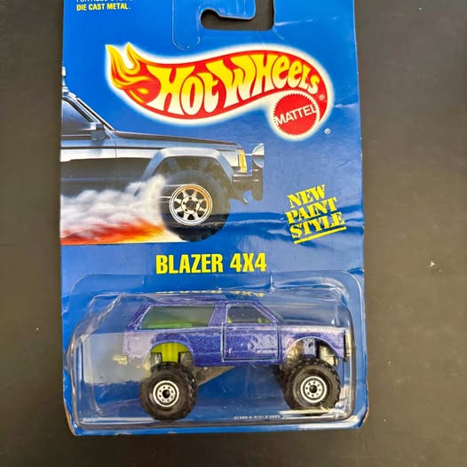 Hot Wheels diecast Blazer 4x4 toy truck, blue, in retail blister pack