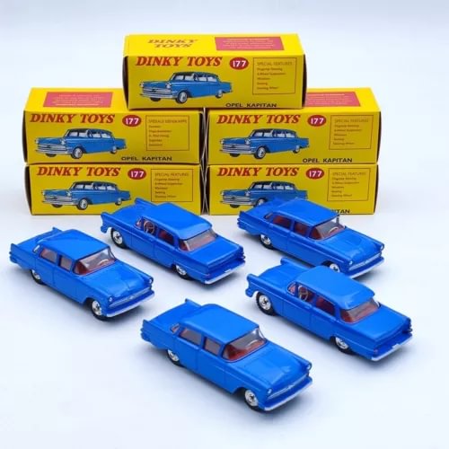 Set of five blue diecast model cars with packaging boxes